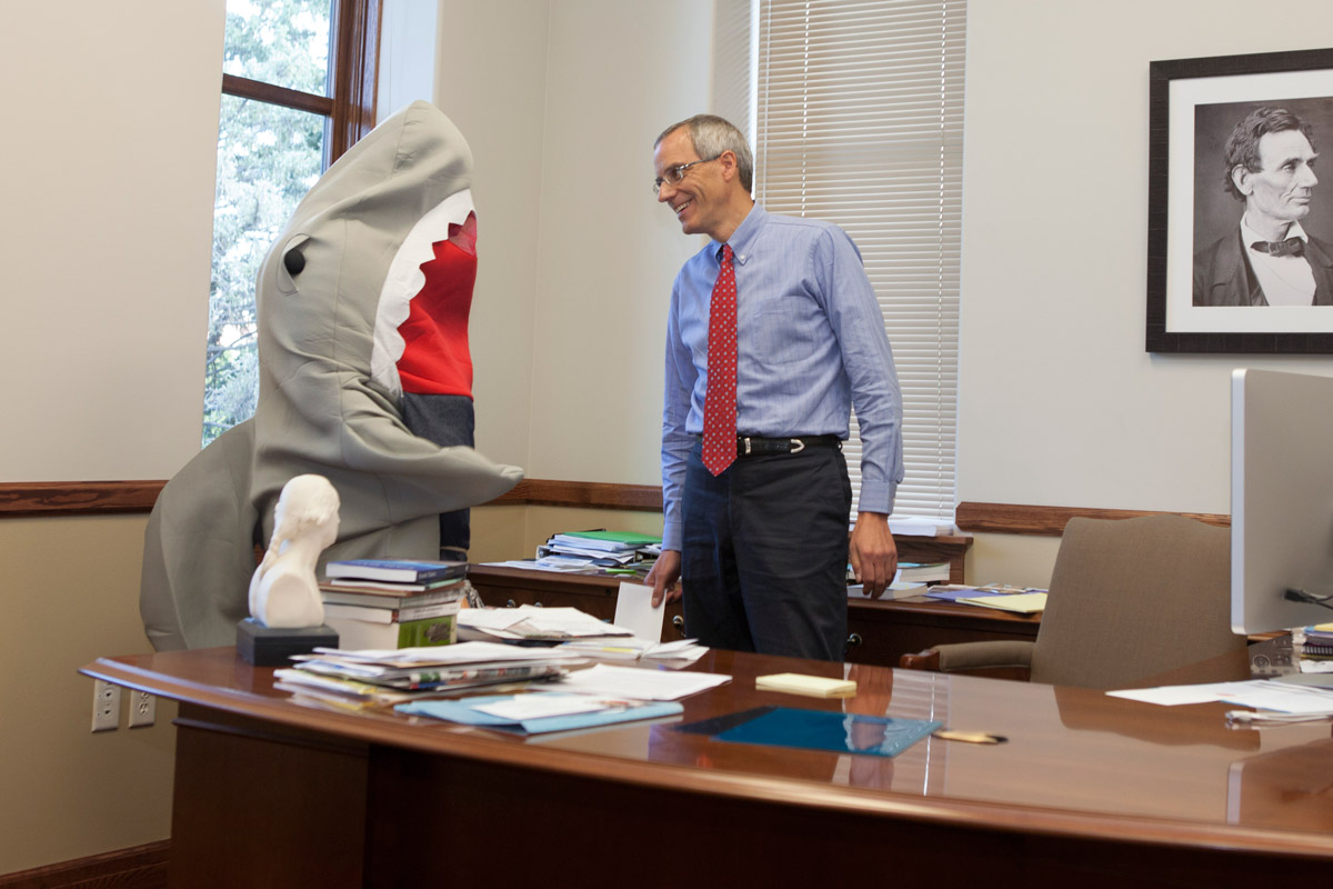 President Wyatt confirms with a shark that he has a spot on the survivors raft