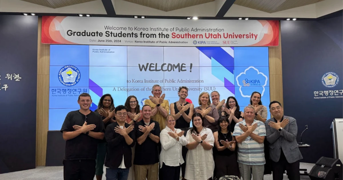 A group of graduate students and faculty from Southern Utah University pose with representatives from the Korea Institute of Public Administration