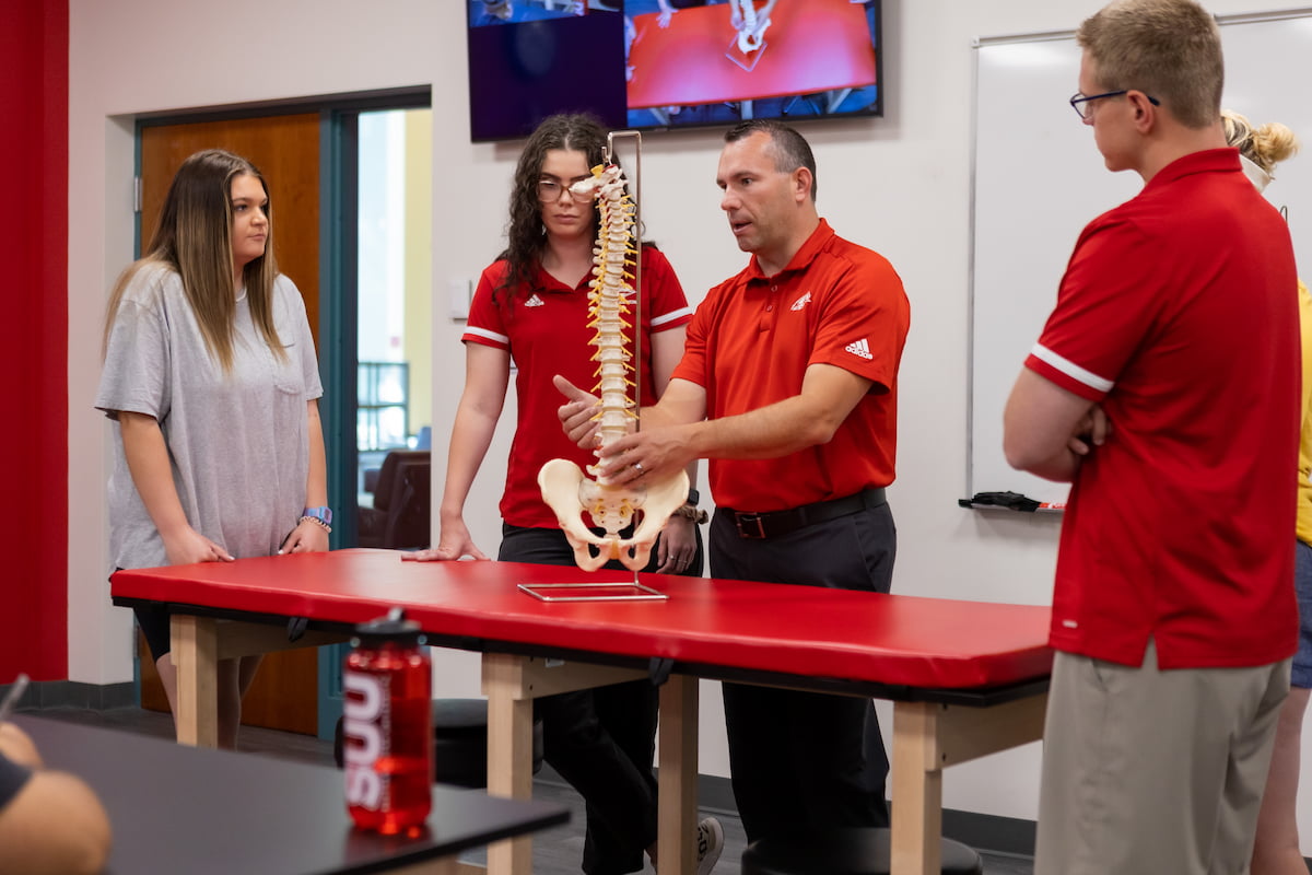 Southern Utah University students examining spinal cord  for Environmental Science Bachelors degree.