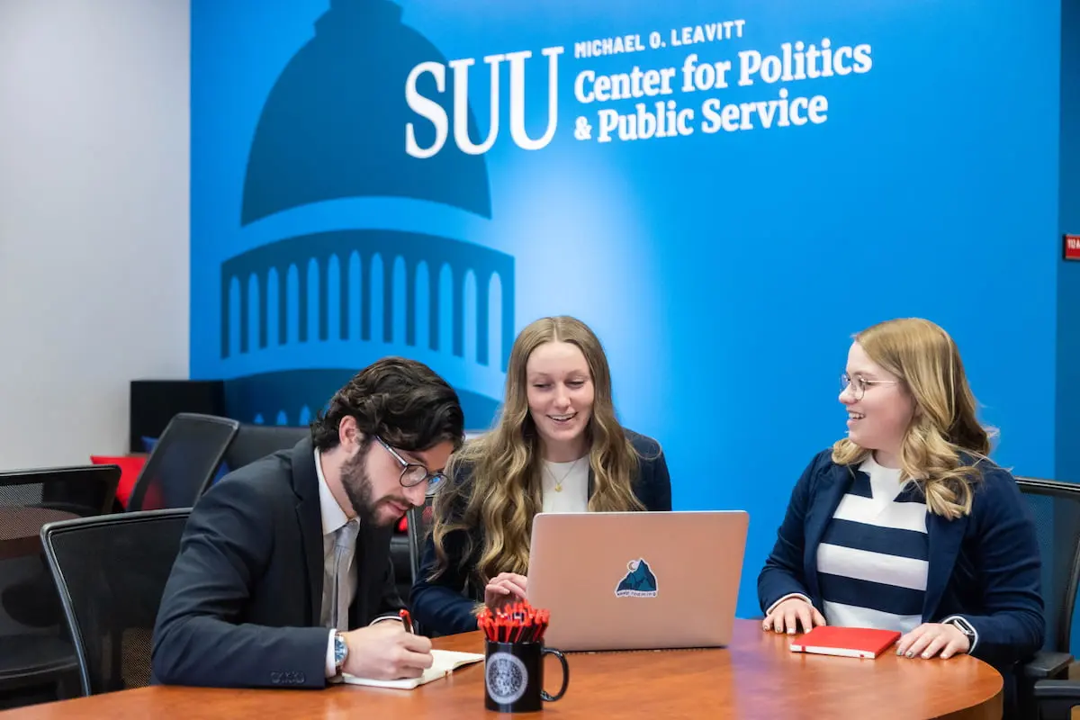 Southern Utah University political science student sitting at table studying Bachelors degree.