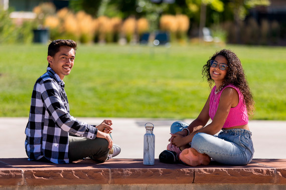 University students studying together and laughing.