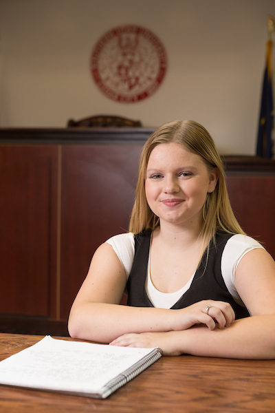 young woman working in courtroom