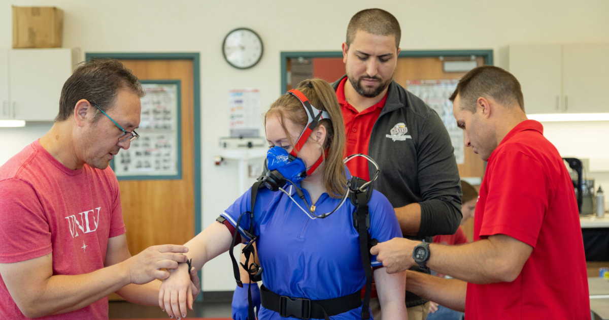 Research from SUU and UNLV connect a research participant to equipment used to monitor the physiological effects of a short walk