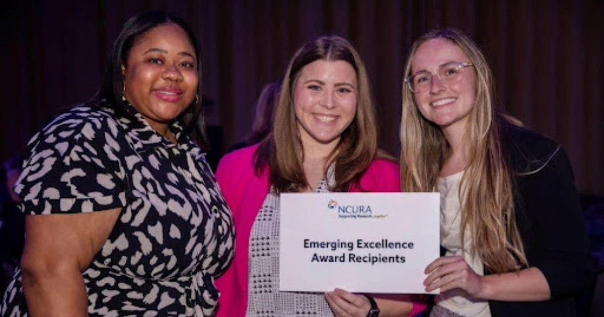 Katie Gomez Freeman (right) stands with two other recipients of the NCURA Emerging Excellence Award