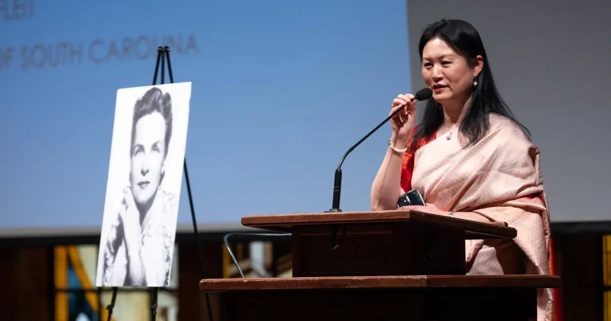 Dr. Wen Ouyang speaking at the Cultural Center second anniversary celebration.