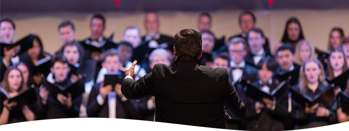 Music conductor leading a choir